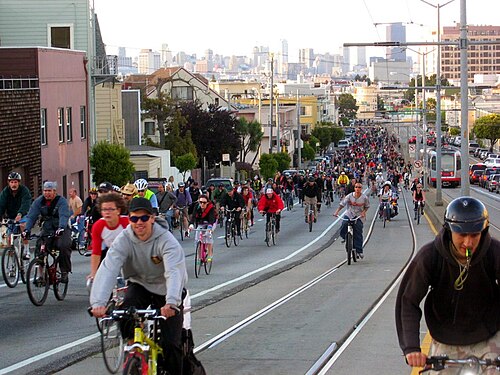 Critical Mass, San Francisco, April 29, 2005 and Muni Metro tram on J Church line