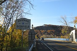 Entering Deerfield crossing the Sunderland Bridge westbound with Sugarloaf Mountain in the background