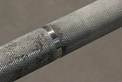 Knurling on an Olympic barbell