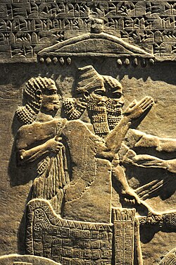 Tiglath-Pileser III, depicted in a royal chariot in one of the reliefs from the royal palace in Nimrud