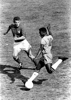 Pelé with Brazil taking on Italy's Giovanni Trapattoni at the San Siro, Milan, in 1963