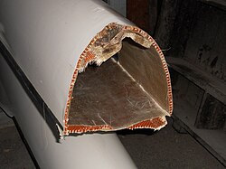 A damaged 8+, showing cross section near the bows and the skin construction.