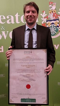Edwards with his certificate naming him as a Freeman of the Borough of Nuneaton & Bedworth