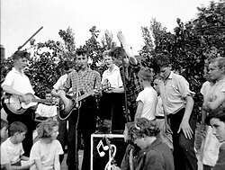 The photograph of the Quarrymen playing at St. Peter's Church garden fête, where Lennon and McCartney first met. From left to right: Griffiths, Hanton, Davis, Lennon, Shotton, Garry