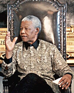In 1986, Obasanjo met with Nelson Mandela. He related that it "was an encounter never to be forgotten. I saw in [Mandela] a South African indeed an African and a world leader of no mean order. He towered physically and metaphorically above all the leaders we met inside South Africa."[163]
