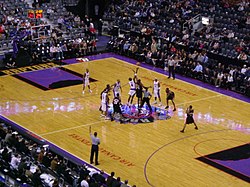 A game between the Raptors and the Portland Trail Blazers during the 2004–05 season. The Raptors were moved to the NBA's Atlantic Division prior to the start of that season.
