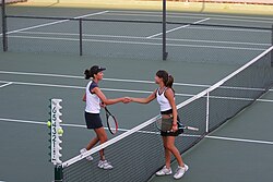 Convention expects that the two players shake hands at the end of a match.