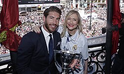 Real Madrid captain Sergio Ramos and Community of Madrid President Cristina Cifuentes with the Primera División trophy during celebrations in Madrid.