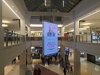 The main atrium has a rotating two-sided video billboard.