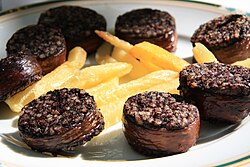 Morcilla de Burgos [es], a blood sausage made with rice fillers. It is consumed in Spain.