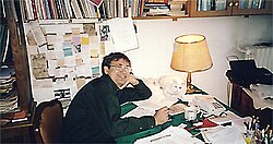 Nobel-laureate Turkish novelist Orhan Pamuk and his Turkish Angora cat at his personal writing space