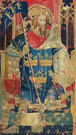Tapestry showing Arthur as one of the Nine Worthies, wearing a coat of arms often attributed to him.[1] c. 1385