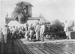 Cotton is loaded onto a ship in the German colony of Togoland, 1885