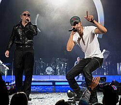 Iglesias performing with Pitbull at the Frank Erwin Center in Austin, Texas, 2015