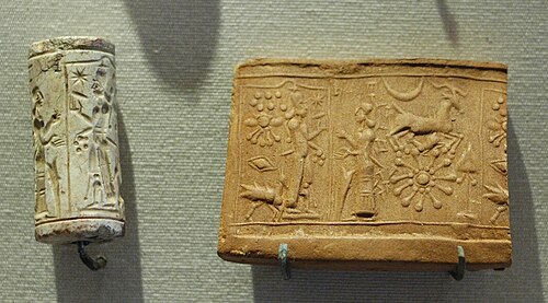 Mesopotamian limestone cylinder seal and the impression made by it—worship of Shamash