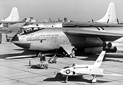 XB-52 prototype on flight line (X-4 in foreground; B-36 behind). Note original tandem-seat "bubble" style canopy, similar to Boeing's earlier B-47 Stratojet.