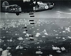 A B-24 Gol'Walloper dropping bombs over Timișoara on 3 July 1944