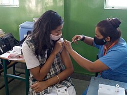 COVID‑19 vaccination for children aged 12–14 in Bhopal, India