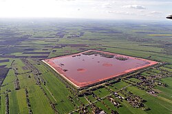 "Bauxite tailings" storage facility in Stade, Germany. The aluminium industry generates about 70 million tons of this waste annually.
