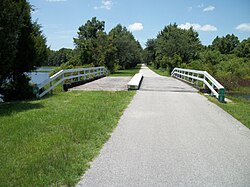 The Withlacoochee State Trail crosses an old railroad bridge over part of Henderson Lake.