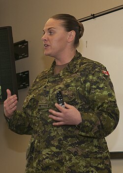 A member of the CAF briefs Vermont Army National Guard soldiers on the integration of women into the forces