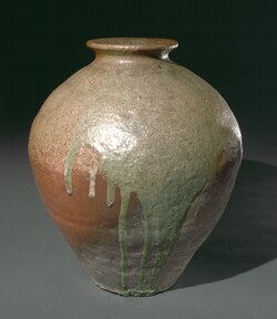 15th-century Japanese stoneware storage jar, with partial ash glaze