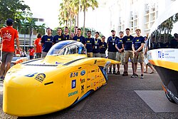 The Solar Car Team team poses for a group photo at the Bridgestone World Solar Challenge 2017 starting line.