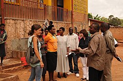 Staff members of GIZ and KfW together with local partners visit a project at a school in Gitega, Burundi