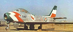 An F-86 Sabre from the Golden Crown aerobatic display team, of the Imperial Iranian Air Force.