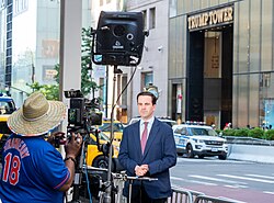 Costa reporting outside Trump Tower during the trial of Donald Trump in May 2024