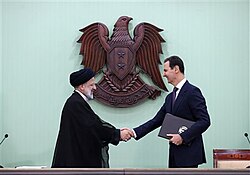 Assad with Iranian President Ebrahim Raisi in Damascus, 3 May 2023