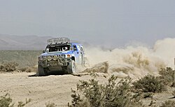 Rob Hall driving SCORE Stock Mini in Baja 1000