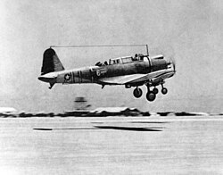 Two SB2U-3s of VMSB-241, MAG-21, take off from Eastern Island shortly before the Battle of Midway