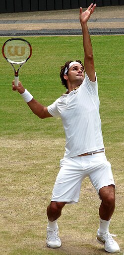 Roger Federer in a serve motion