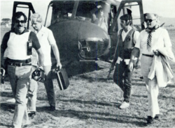 Armed Department of State security agents accompany U.S. Ambassador Deane Hinton in El Salvador in the early 1980s
