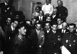 Severino Di Giovanni (on the left) in court