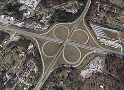 A full cloverleaf interchange between APD-40 and U.S. Route 64 near Cleveland, Tennessee 35°08′59.4″N 84°50′52.3″W / 35.149833°N 84.847861°W