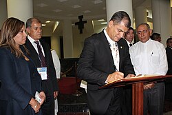 President of Ecuador, Rafael Correa signs the guestbook at the Tomb of Monsignor Óscar A. Romero. During Beatification of Archbishop Romero San Salvador El Salvador