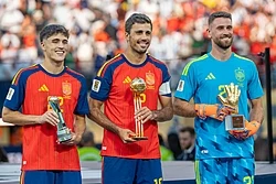 Left to right: Young Player Award winner Pau Cubarsí, Golden Ball winner Rodri, and Golden Glove winner Unai Simón.