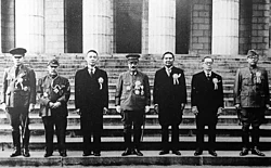 Japan's Prime Minister Hideki Tojo (center) with fellow government representatives of the Greater East Asia Co-Prosperity Sphere. To the left of Tojo, from left to right: Ba Maw from Burma, Zhang Jinghui, Wang Jingwei from China. To the right of Tojo, from left to right, Wan Waithayakon from Thailand, José P. Laurel from the Philippines, and Subhas Chandra Bose from India.