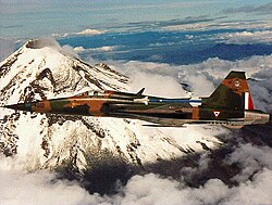 Mexican Air Force F-5 Tiger II flying near the Popocatépetl Volcano