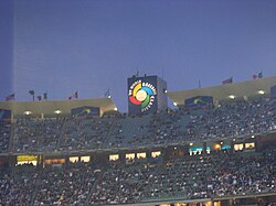 Dodger Stadium hosting the 2009 World Baseball Classic. The top of a ten-story elevator shaft bears the World Baseball Classic logo.