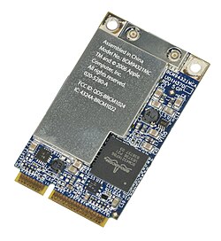 An AirPort Wi‑Fi adapter, supporting 802.11g, from an Apple MacBook