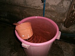 The timba (pail) and the tabo (dipper), the two essentials in Philippine bathrooms and bathing areas.