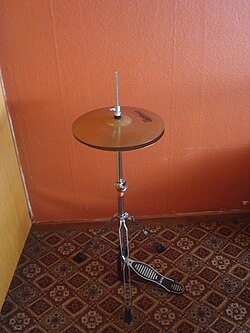 Two hi-hat cymbals mounted in a pedal-operated stand, which allows the drummer to close or open the cymbals.
