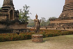 A classic Sukhothai-style Buddha statue