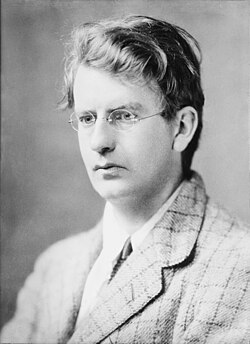 Television pioneer John Logie Baird (seen here in 1917) televised the BBC's first drama, The Man with the Flower in His Mouth, on 14 July 1930, and the first live outside broadcast, The Derby, on 2 June 1931.[24][25]