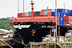 Gatun locks showing the "mule" locomotives at work