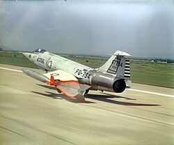 An F-104G target tug of the Republic of China Air Force (ROCAF) taking off from Ching Chaun Kang AB, Taichung, Taiwan, in 1969, with a Dart tow target slung under its wing.