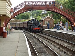 Goathland railway station on the North Yorkshire Moors Railway, showing preserved rolling stock, buildings and infrastructure.